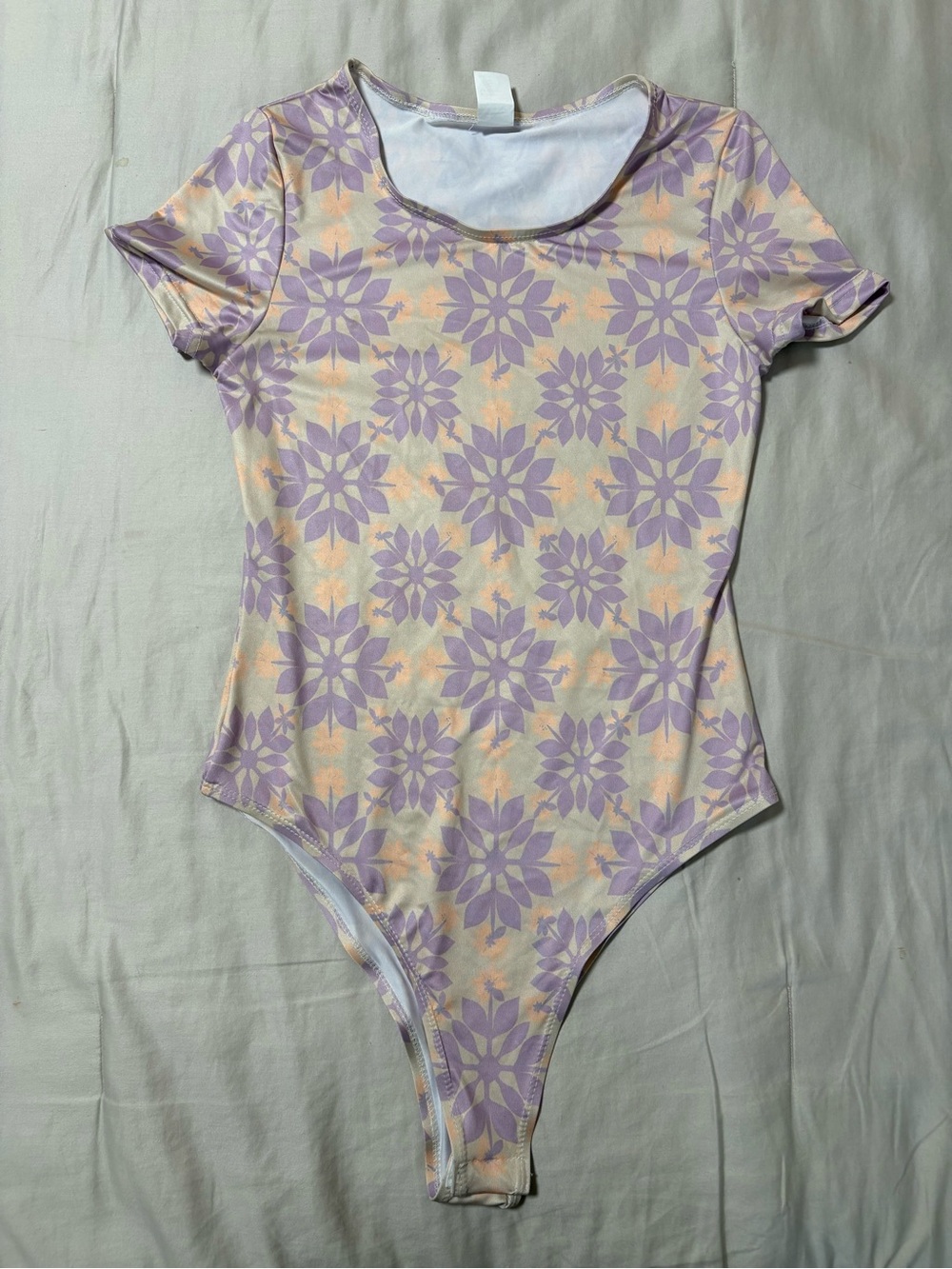 Benoa Swim Lavender Floral Short-Sleeve One-Piece Romper